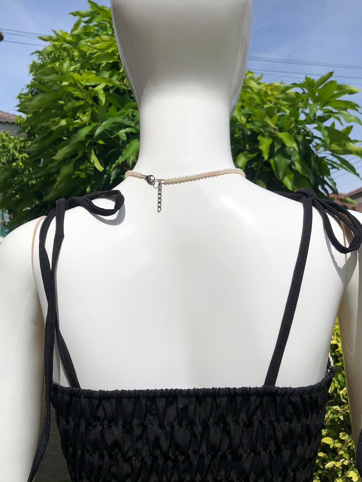Elegant Black Camisole with Lace Trim and Adjustable Straps