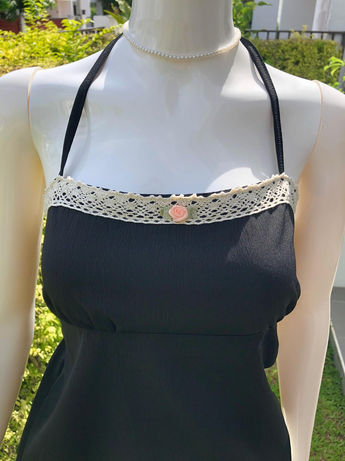 Elegant Black Camisole with Lace Trim and Adjustable Straps